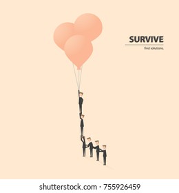 Business team flying with balloons to get out the old idea and find the new solutions. Business concept of teamwork, creativity, success, challenge and opportunity.