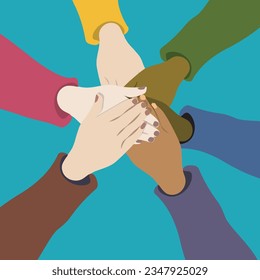 business team with hands on top, isolated on blue background. 