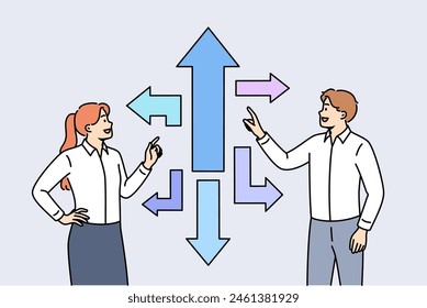 Business team looking for strategic path and solution to achieve success standing near different arrows. Man and woman choose one of options to achieve strategic goals of corporation