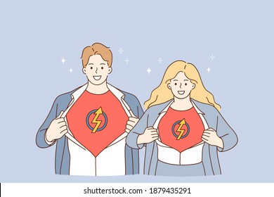 Business Team And Successful Cooperation Concept. Young Man And Woman Business People Partners Standing Together And Showing Superman Sign On Chests Meaning Strength Of Union