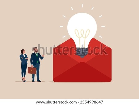 Business team thinking looking on with big e-mail with light bulb. Think big, aspiration to win and success in business, big idea from creativity and imagination to overcome fear. 