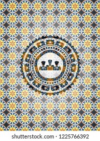 business teamwork icon inside arabic badge background. Arabesque decoration.