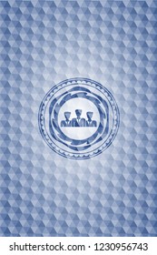 business teamwork icon inside blue emblem with geometric pattern.