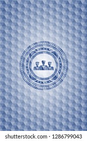 business teamwork icon inside blue hexagon emblem.