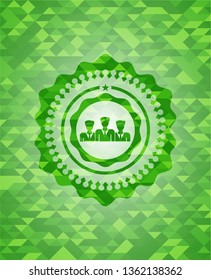 business teamwork icon inside green mosaic emblem