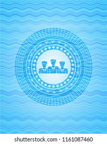 business teamwork icon inside light blue water wave badge background.