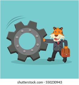 business tiger pushing gear