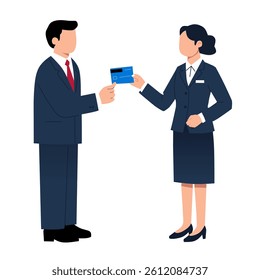 A business transaction where a man hands a card to a woman in a professional setting.