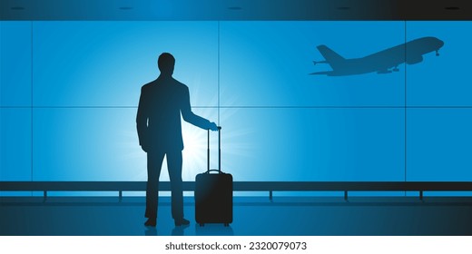 Business travel concept, with a lonely man waiting alone at the airport before boarding a plane.