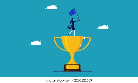 Business victory. businesswoman raising a flag on a winning trophy