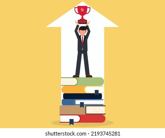 Business visionary leader. Businessman holding a trophy standing on a pile of books and knowledge