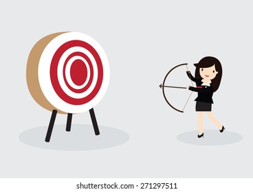 Business woman with arrow is aiming at target