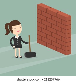 business woman breaking wall with hammer