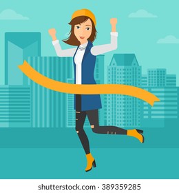 Business woman crossing finish line.