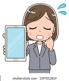 A business woman in a gray suit.She has a smartphone in her hand.She has a troubled face.
