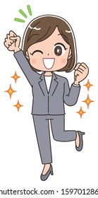 A business woman in a gray suit.She pushes her fist up.