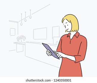 business woman and her working space. hand drawn style vector design illustrations.