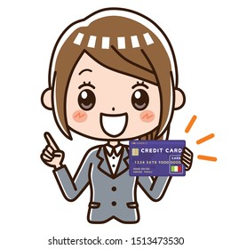 Business woman holding a credit card.