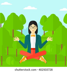 Business woman meditating in lotus pose.