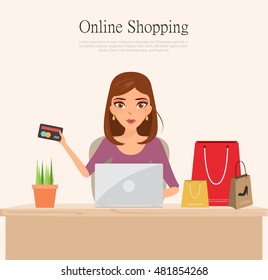 business woman with online payment for shopping online at desk.