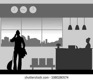 A business woman phones in the lobby of the hotel, one in the series of similar images silhouette