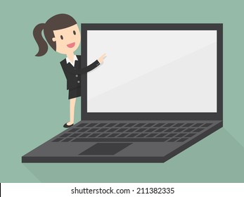 business woman pointing to laptop display