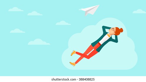 Business woman relaxing on cloud.