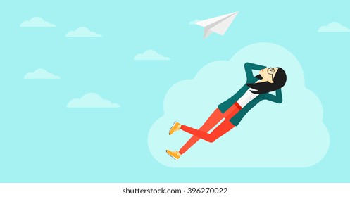 Business woman relaxing on cloud.