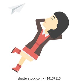 Business woman relaxing on cloud.