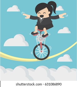 Business Woman riding bike one wheel on a rope