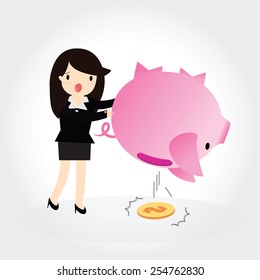 Business woman shaking an empty piggy bank