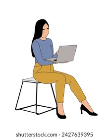 Business woman sitting on the chair with laptop.