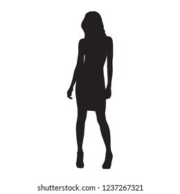 Business woman in skirt and high heels shoes standing, isolated vector silhouette, front view