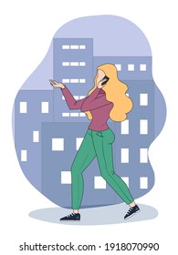 business woman talks phone. Girl walks the street town holds phone and talks. 