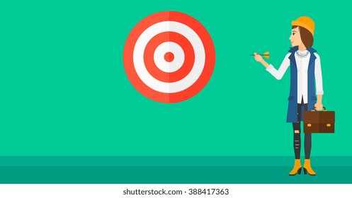 Business woman with target board.