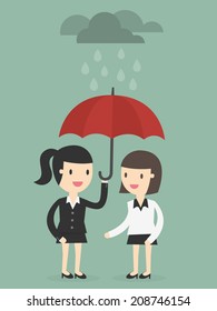 business woman with umbrella protects another woman from rain