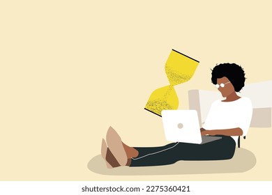 business woman using laptop with an hourglass. concept of multitasking, productivity and time management