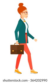 Business woman walking with briefcase. 