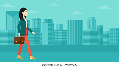 Business woman walking with briefcase. 