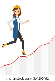 Business woman walking upstairs.