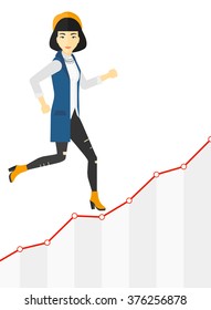 Business woman walking upstairs.