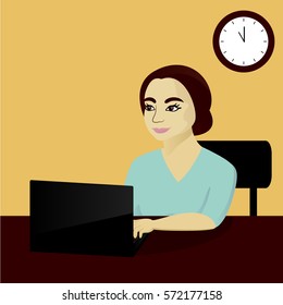 Business woman working at laptop in office