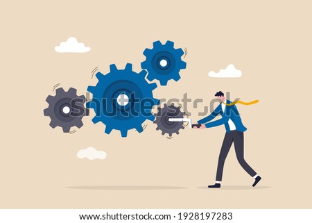 Business work flow, leadership to drive team and initiate productivity and efficiency working process concept, smart businessman manager use all his power and skill to rotate group of cogwheels gear.
