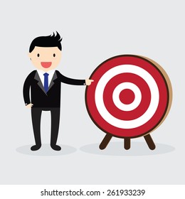 Businessman with arrow is aiming at target