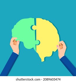 A businessman assembles a brain puzzle. connect thoughts in the brain