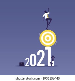 Businessman balance target on 2021 number-Risk management challenge concept, If the goal is not appropriate There will be a high risk