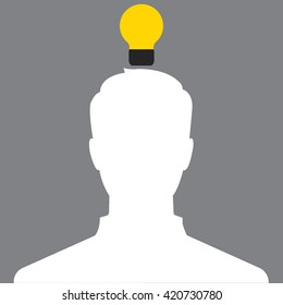 The businessman with a beard pointing to the bulb. Idea concept.