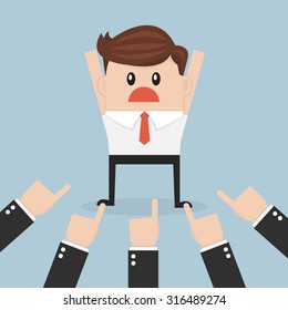 Businessman being pointed at by a lot of hands, vector, flat design