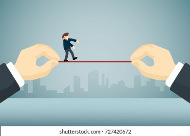 businessman with blindfold walking on tighten rope by big businessman's hands 