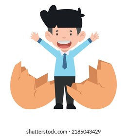 Businessman breaking out of an eggshell
